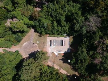 High angle view of trees and plants by building