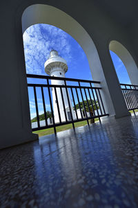 Low angle view of building against cloudy sky