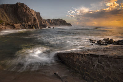 Scenic view of sea against sky during sunset