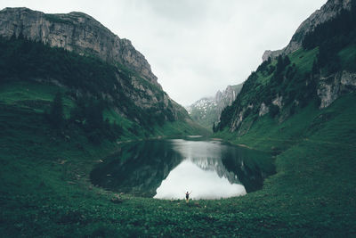 Scenic view of falensee lake amidst mountains