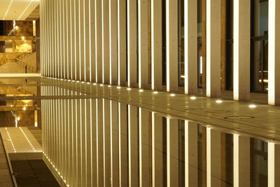 Illuminated lights on ceiling of building