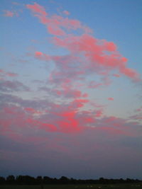 Low angle view of dramatic sky during sunset