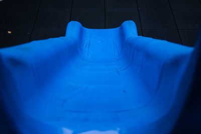 High angle view of blue ball hanging on floor