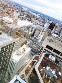 High angle view of buildings in city against sky