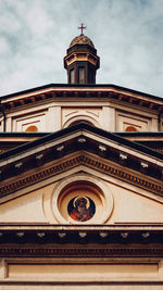 Low angle view of ornate building against sky