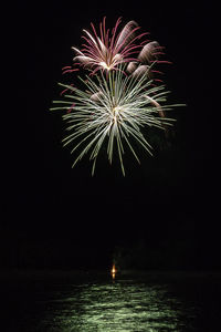 Firework display at night