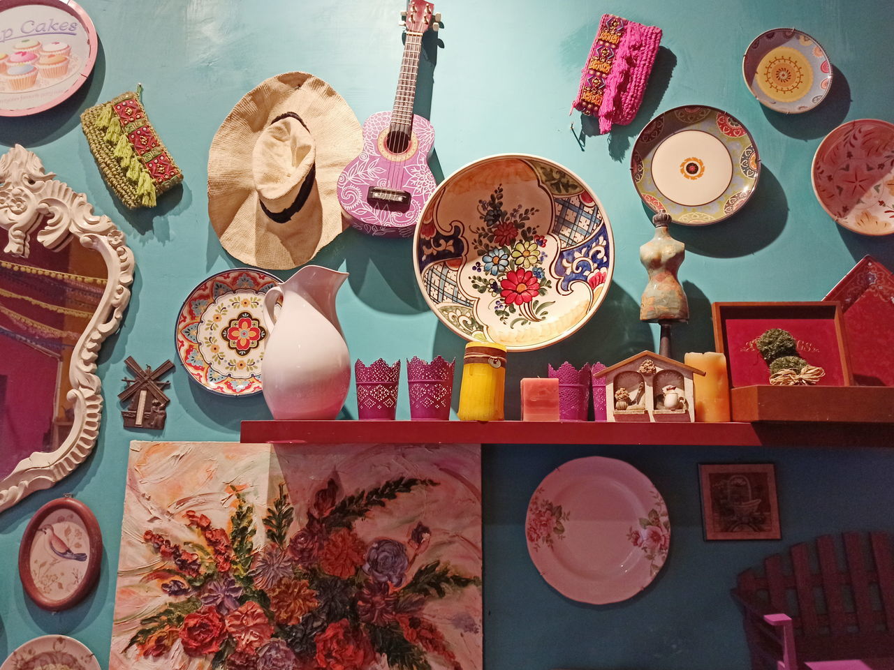 HIGH ANGLE VIEW OF MULTI COLORED OBJECTS ON TABLE