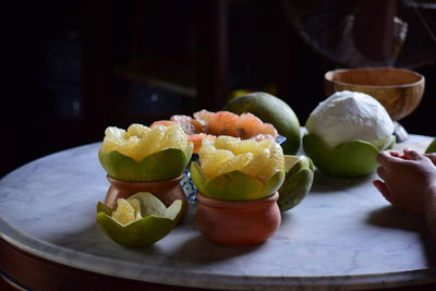 Close-up of fruits in plate on table
