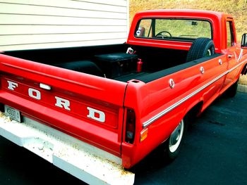 Close-up of red vintage car