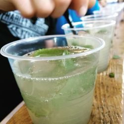 Close-up of hand holding drink