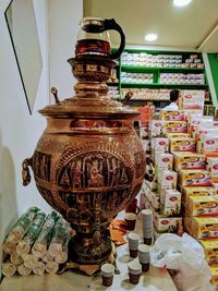 Close-up of illuminated jar on table