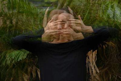 Blur motion of woman by plants