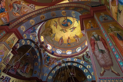 Low angle view of ornate ceiling of building