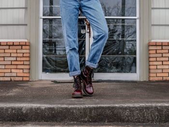 Low section of a person standing on platform 