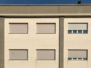 Low angle view of building windows 