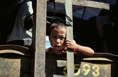 Close-up of boy playing on playground