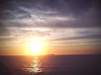 Scenic view of sea at sunset