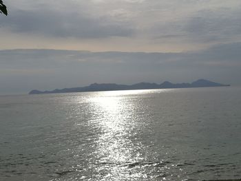 Scenic view of sea against sky at sunset