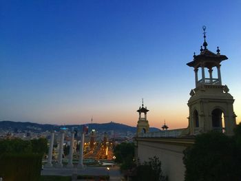 View of cityscape against clear sky