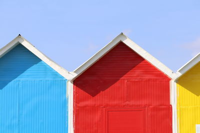 Low angle view of building against blue sky