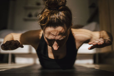 Woman exercising at home