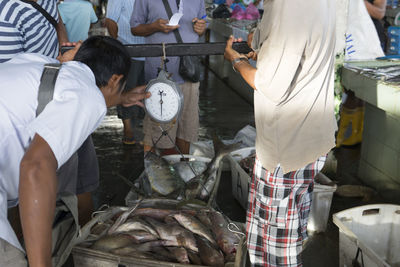 People at fish market