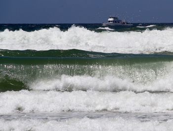 Waves splashing on rocks