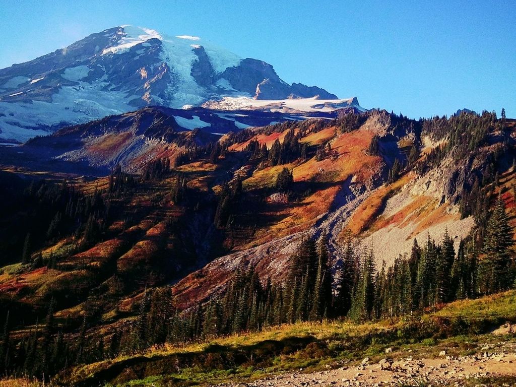 mountain, mountain range, tranquil scene, tranquility, scenics, landscape, clear sky, beauty in nature, non-urban scene, rocky mountains, nature, rock formation, physical geography, geology, remote, rock - object, blue, tree, idyllic, snow