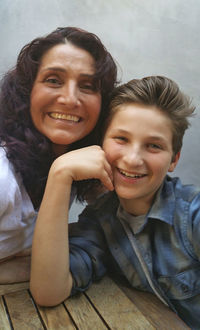 Portrait of smiling mother and son