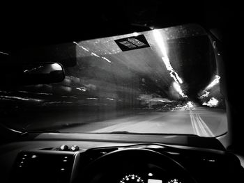 Close-up of car windshield at night