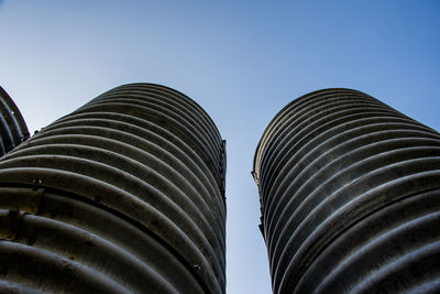 Cisterns stand out against the blue sky in valdagno, vicenza, italy