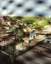 Railroad tracks amidst trees against sky