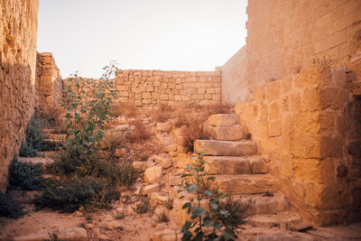 View of old ruin building against sky