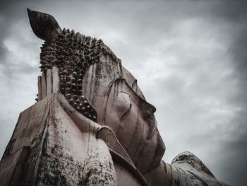 Low angle view of statue against sky