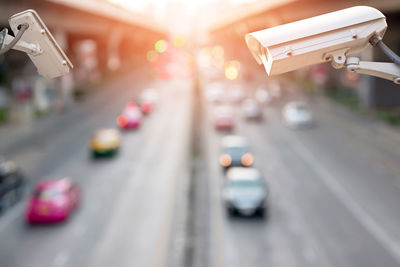 Closeup of traffic security camera surveillance cctv on the road in the big city.