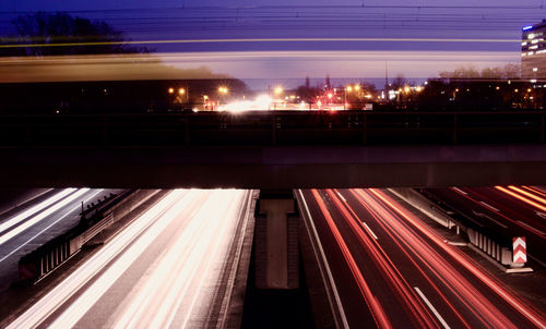 Light trails on street in city at night