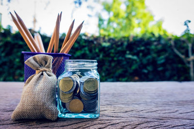 Close-up of glass jar on table