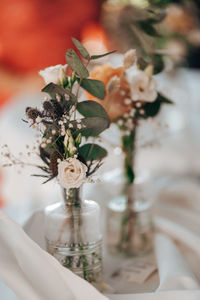 Cropped hand of woman holding bouquet