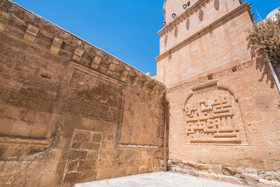 Low angle view of historical building against sky