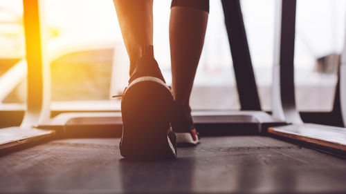 Low section of woman standing on floor