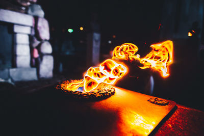 Close-up of illuminated fire at night