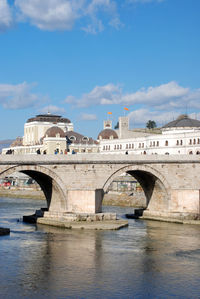 View of bridge over river in city