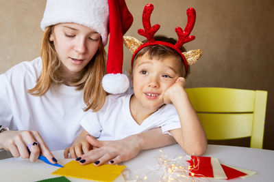 Portrait of smiling girl with christmas decoration