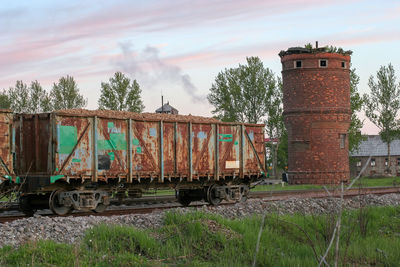 Train on railroad track against sky