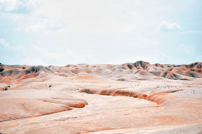 Scenic view of desert against sky