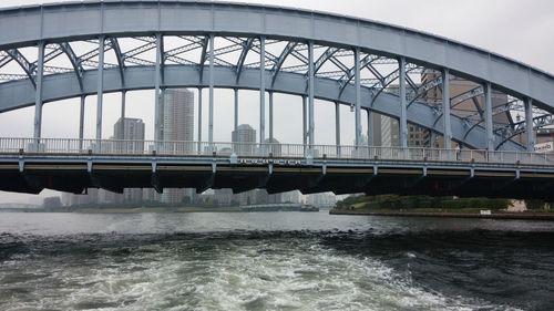 View of bridge over river against sky