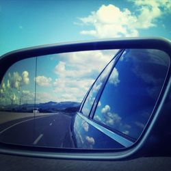 Cropped image of car on road