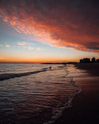 Scenic view of sea against dramatic sky