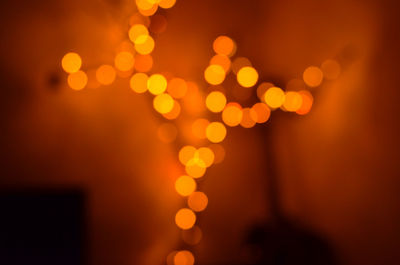 Defocused image of illuminated lights at night