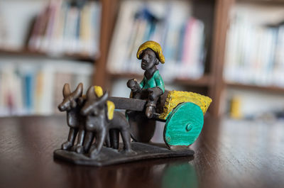 Close-up of toys on table at home